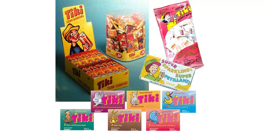 Zum Neuanfang in den 90ern prangte ein neuer Tiki-Bub auf den Verpackungen. Dazu reichte die Geschmackspalette von Himbeer und Cola über Apfel und Pfirsich bis zu Banane.