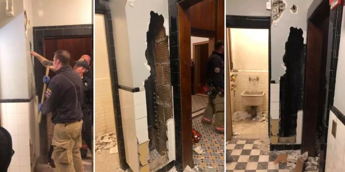 Die US-Feuerwehr befreit einen Mann aus einer Wand. wand