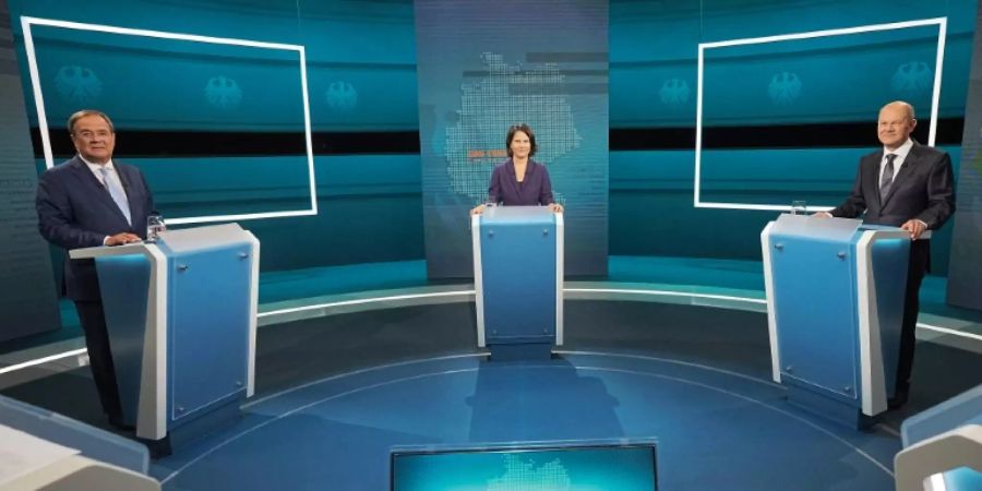 Laschet, Baerbock und Scholz vor Fernsehdebatte