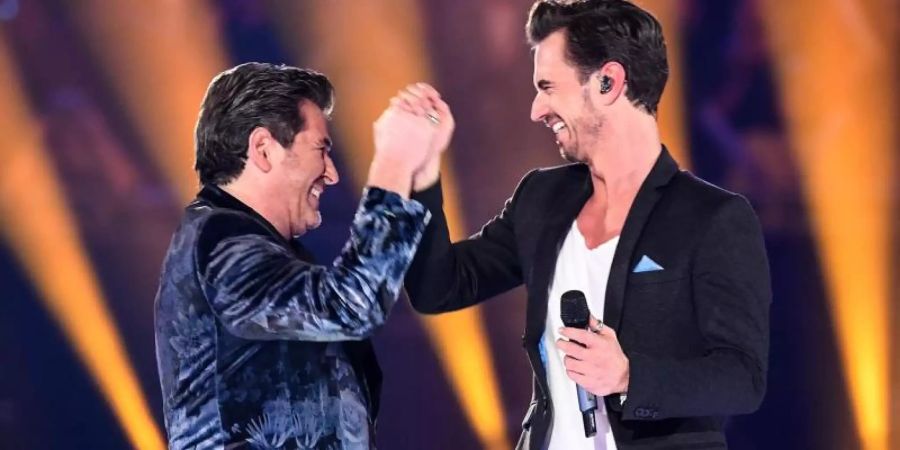 Thomas Anders und Florian Silbereisen triumphieren mit «Das Album». Foto: Britta Pedersen/dpa-Zentralbild/dpa