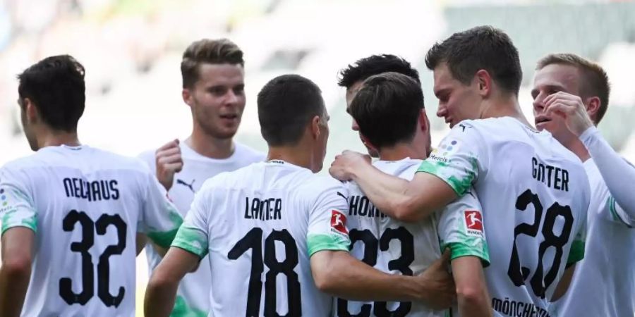 Ein Sieg gegen Absteiger SC Paderborn ist für die Profis von Borussia Mönchengladbach Pflicht. Foto: Federico Gambarini/dpa-Pool/dpa