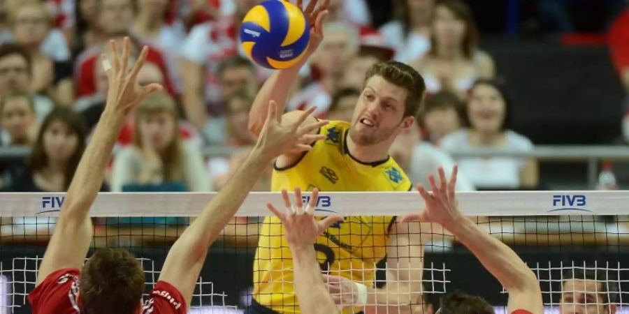 Eder Carbonera (M) spielt jetzt für die Berlin Volleys. Foto: Bartlomiej Zborowski/PAP/dpa