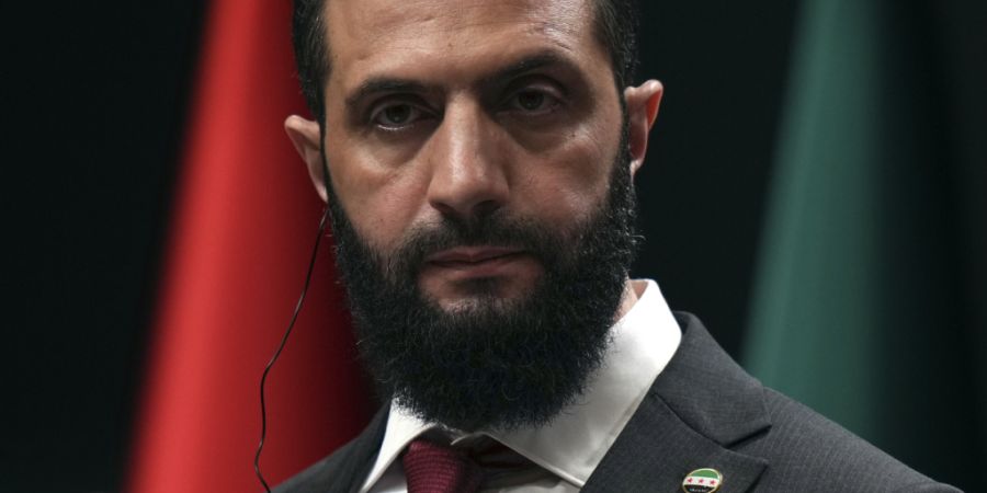 ARCHIV - Syriens Übergangspräsident Ahmed al-Scharaa auf einer Pressekonferenz in Ankara. Foto: Francisco Seco/AP/dpa