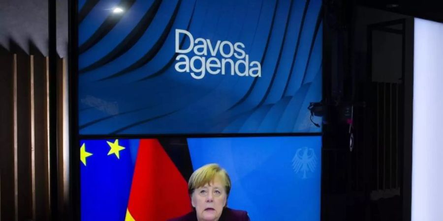Bundeskanzlerin Angela Merkel spricht während einer Videokonferenz bei der Davos Agenda im Rahmen des Weltwirtschaftsforum. Foto: Salvatore Di Nolfi/KEYSTONE/dpa