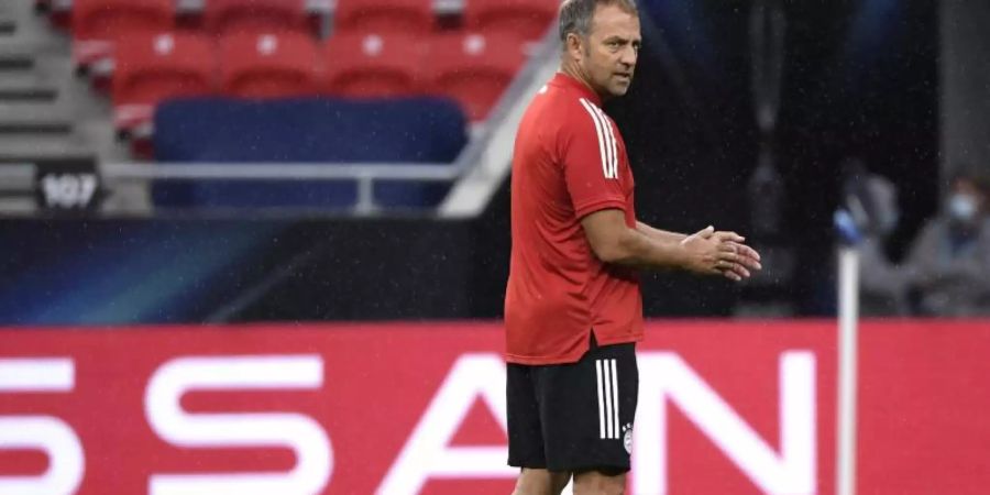 Bayern-Trainer Hansi Flick muss mit seinem Team bei der TSG 1899 Hoffenheim antreten. Foto: Attila Kisbenedek/Pool AFP/AP/dpa