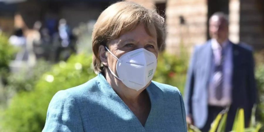 Angela Merkel hat ein positives Fazit ihres ersten Treffens mit US-Präsident Biden gezogen. Foto: Leon Neal/getty pool/AP/dpa