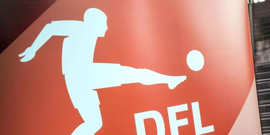 Das Logo Deutschen Fussball Liga. Foto: Frank Rumpenhorst/dpa