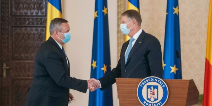 Klaus Iohannis (r.) und Nicolae Ciuca