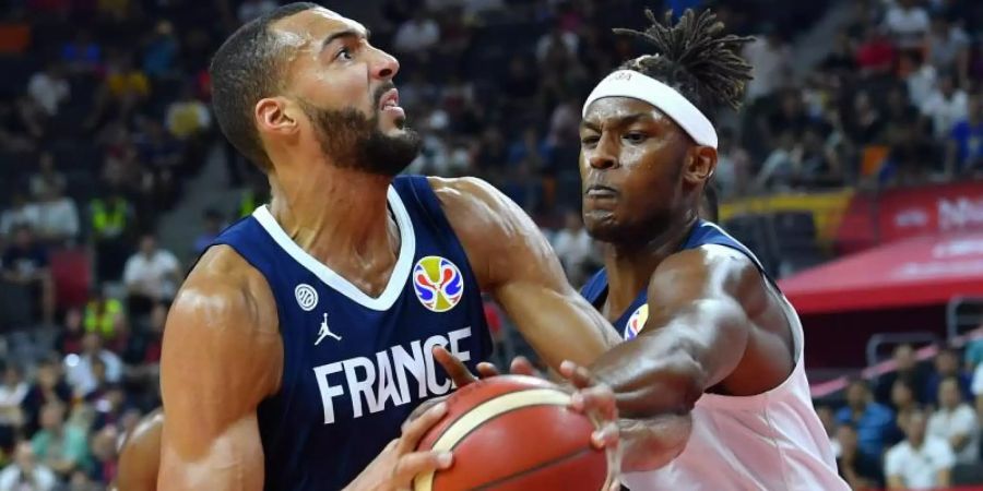NBA-Center Rudy Gobert (l) führte die Franzosen zum Sieg. Foto: Zhu Zheng/XinHua
