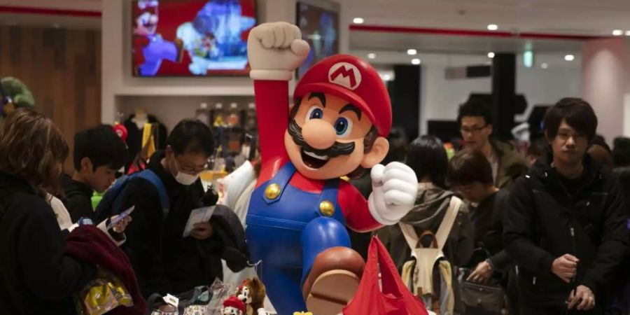 Der japanische Videospielhersteller Nintendo meldet einen Anstieg des Quartalsgewinns aufgrund der soliden Nachfrage nach seiner Switch-Konsole während der Einkaufssaison zum Jahresende. Foto: Jae C. Hong/AP/dpa