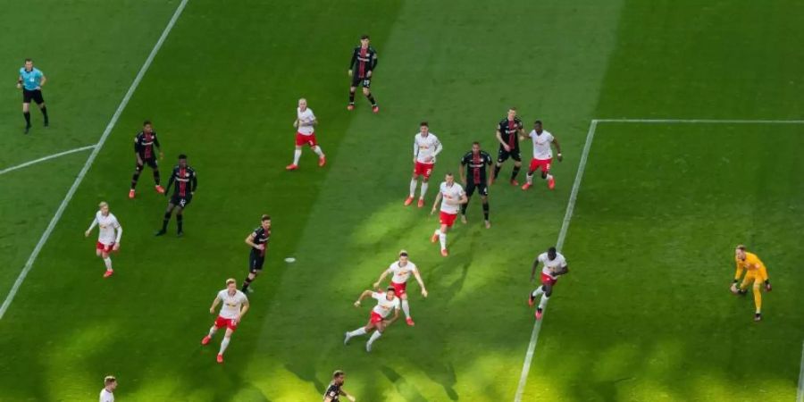 Die Bundesliga steht vor reichlich Problemen rund um den 30. Juni, dem Tag des bislang vereinbarten Endes der Spielzeit. Foto: Robert Michael/dpa-Zentralbild/dpa