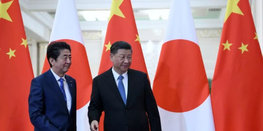 Abe und Xi bei einem Treffen im Dezember 2019 in Peking