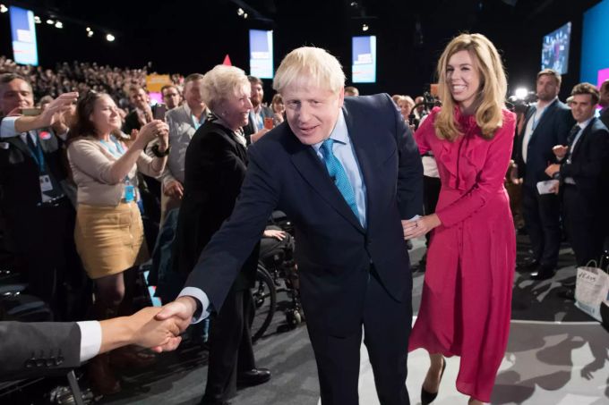 Premierminister Boris Johnson und seiner Partnerin am Parteitag der konservativen Torys. Conservative Party Conference