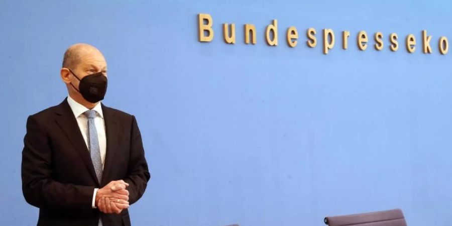 Olaf Scholz plant für 2022 eine Neuverschuldung von rund 81,5 Milliarden Euro. Foto: Wolfgang Kumm/dpa