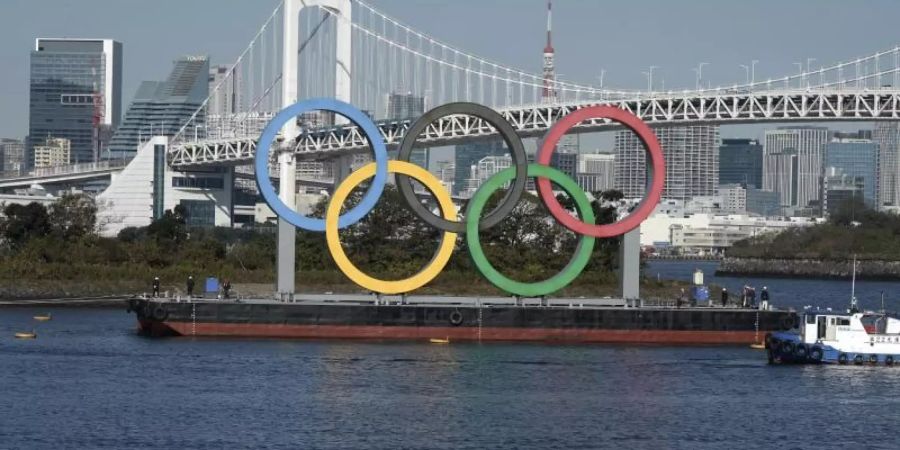 Trotz der Corona-Pandemie soll es für die Sommerspiele in Tokio keine Impfpflicht geben. Foto: Eugene Hoshiko/AP/dpa