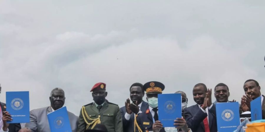 Die sudanesische Regierung und Rebellenführer