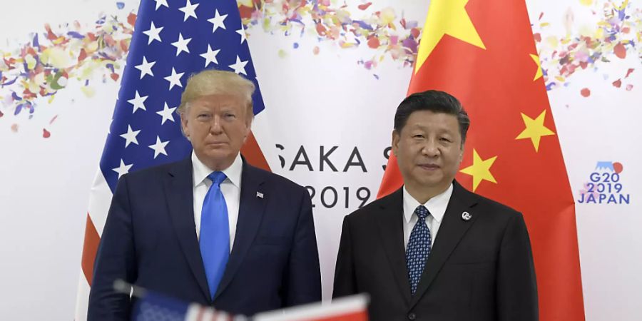 Die Spannungen zwischen China und den USA nehmen zu. Der chinesische Präsident Xi Jingping (rechts) fordert den amerikanischen Präsidenten Donald Trump auf, die Schulden bei der Uno zu begleichen. (Archivbild)