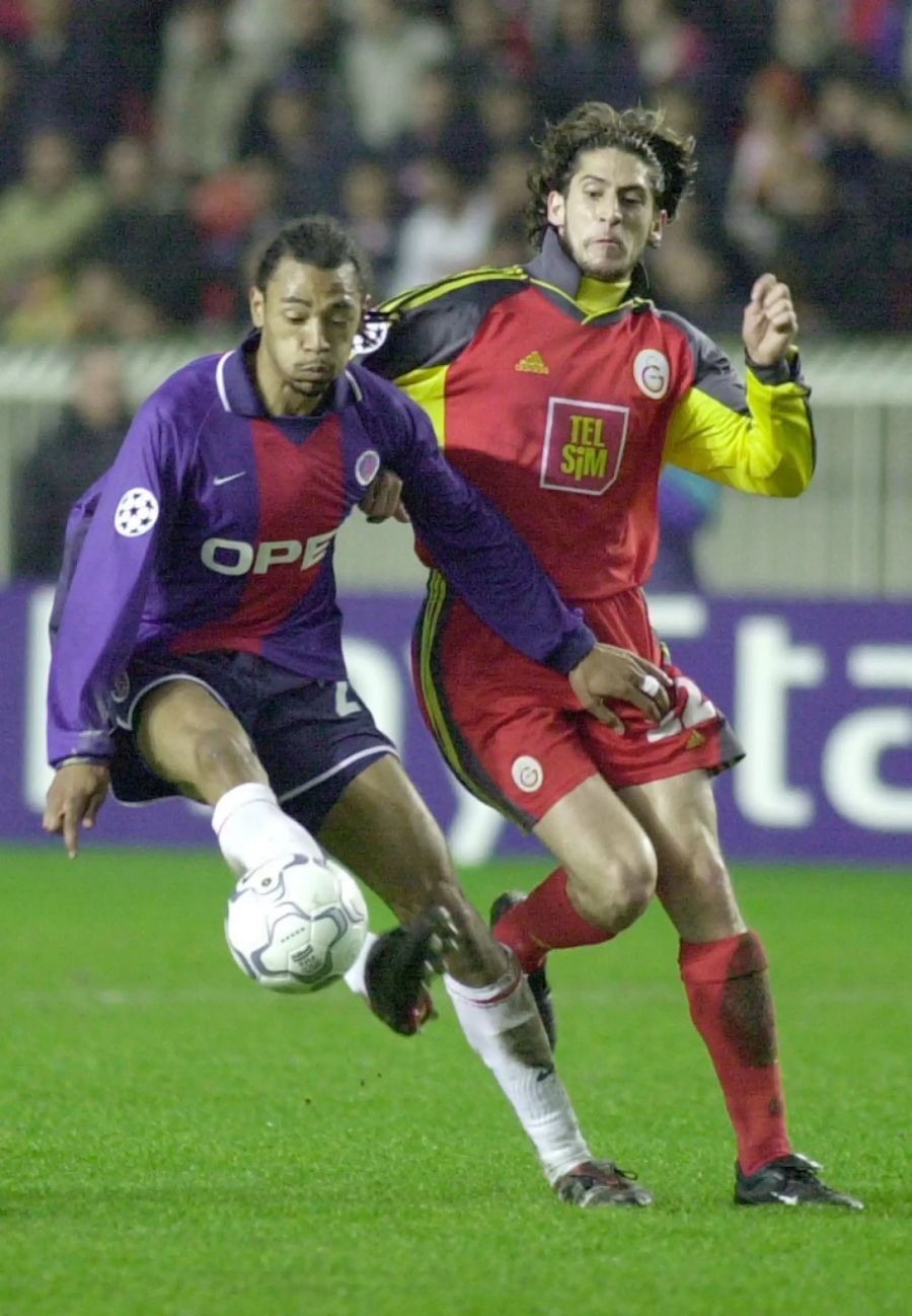 Edouard Cisse (l.) lief über 250-mal für PSG auf.