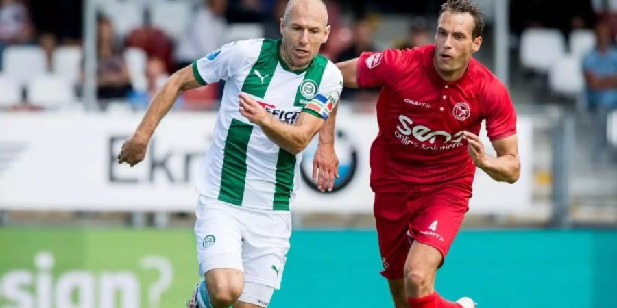 Arjen Robben (l) spielt jetzt für den FC Groningen. Foto: Cor Lasker/ANP/dpa