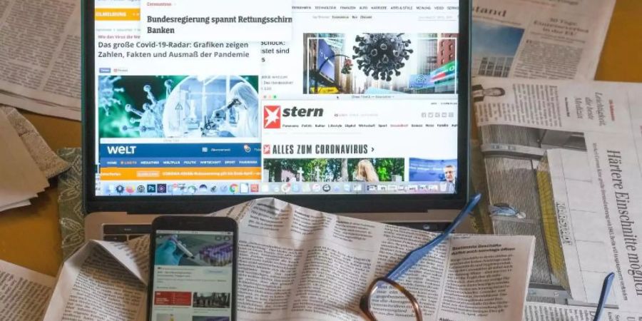 67 Prozent der Befragten einer Studie halten die Informationen in den Medien alles in allem für glaubwürdig. Foto: Jens Kalaene/dpa-Zentralbild/dpa