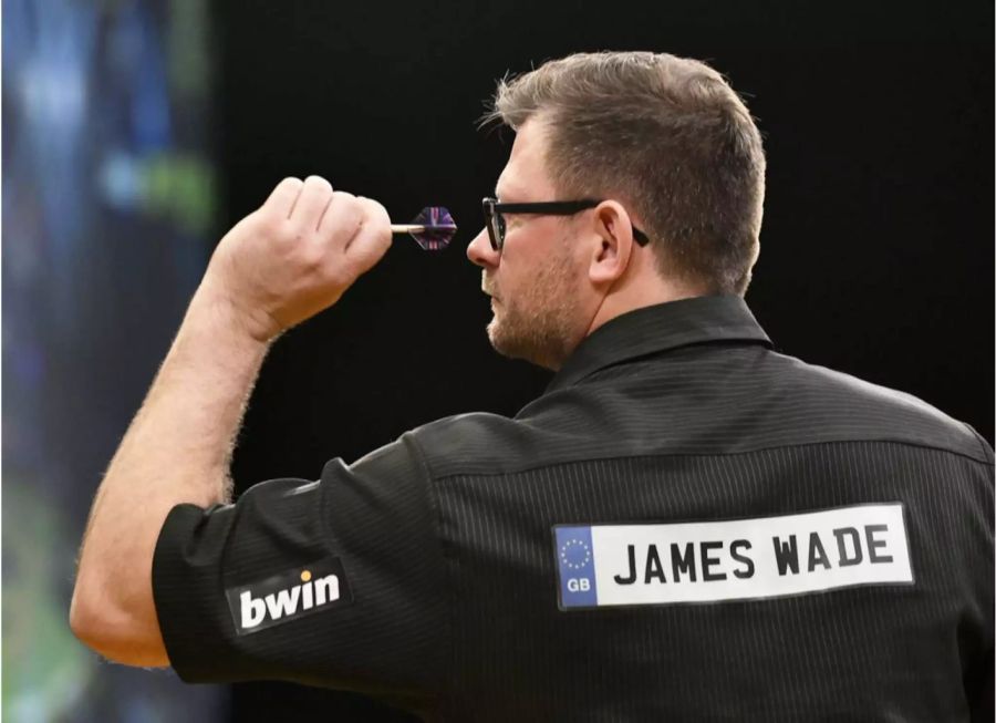 James Wade (35). «The Machine»  wurde in diesem Jahr Europameister und darf sich ebenfalls Aussenseiterchancen ausrechnen.