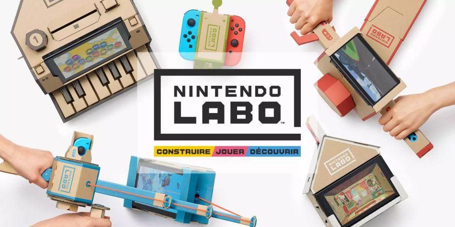 Ein generisches Nintendo Labo Bild. Diverse Labo Konstrukte, wie eine Angelrute ein Haus oder ein Piano sind zu sehen. In der Mitte steht gross Nintendo Labo geschrieben.