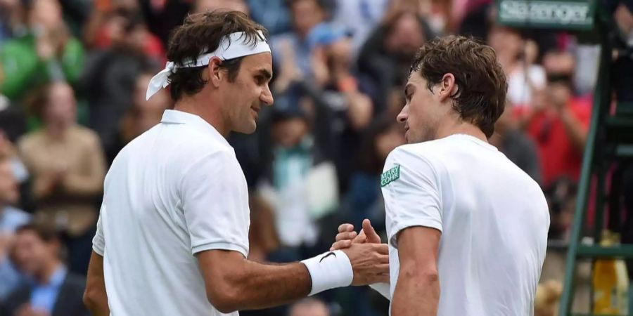 Federer (links) bei der ersten Begegnung mit Guido Pella (links)