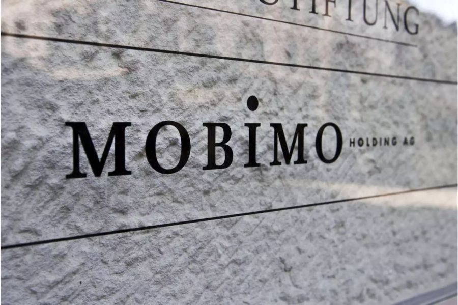 Mobimo Schriftzug auf Marmorplatte - Keystone