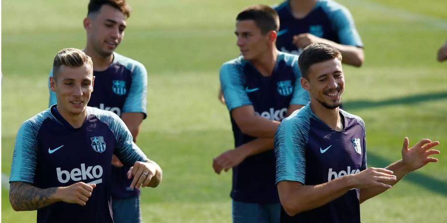 Lucas Digne (l.) beim Training mit dem FC Barcelona.