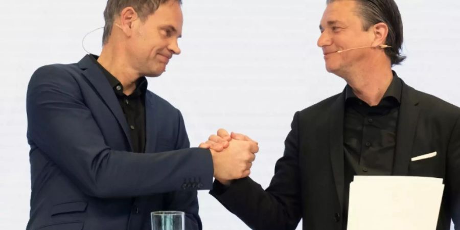 Porsche-Chef Blume (links) und Finanzvorstand Meschke
