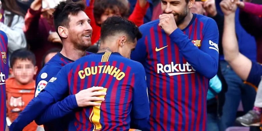 Lionel Messi, Philippe Coutinho und Gerard Piqué freuen sich über einen weiteren Sieg