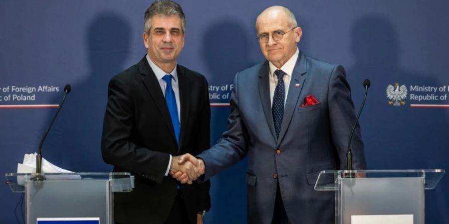Cohen (li) und Rau in Warschau