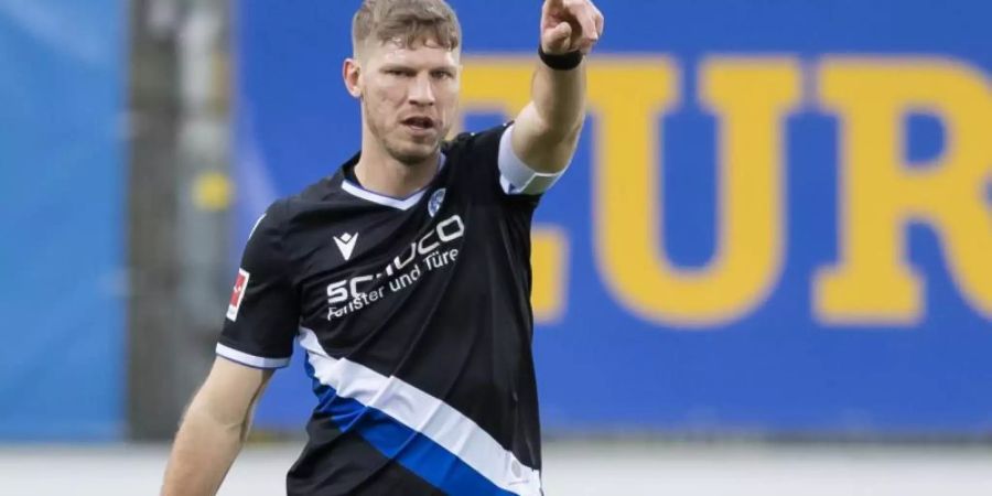 Bleibt bei Arminia Bielefeld: Kapitän Fabian Klos. Foto: Tom Weller/dpa