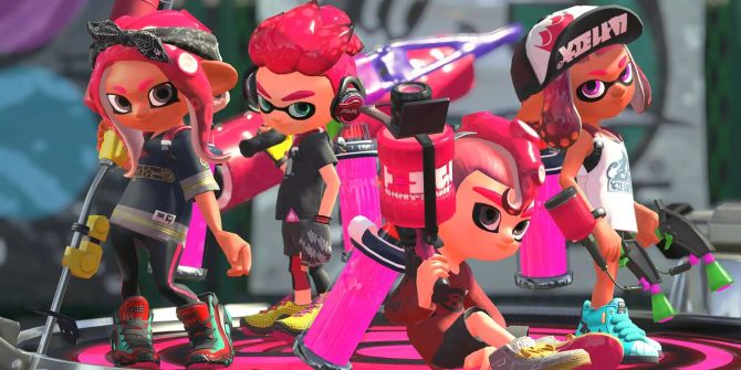 Einige Splatoon 2 Charaktere in Pink stehen auf einer Plattform.