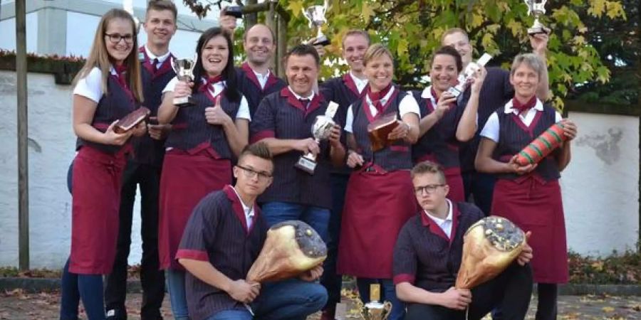 Der Schinken-König und sein Metzger-Team.