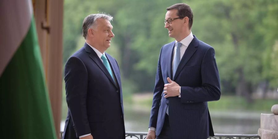 Viktor Orban (l.) und Mateusz Morawiecki äusserten sich zur Flüchtlingsverteilung.