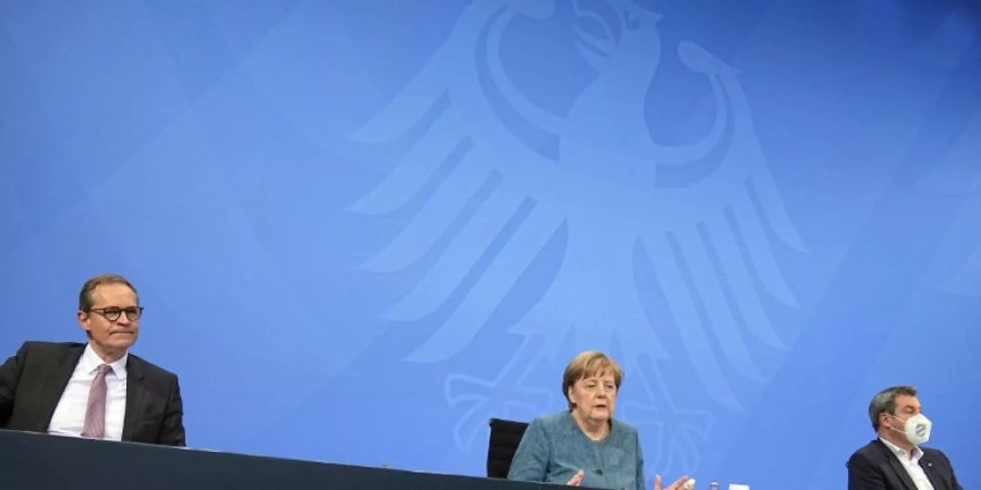 Müller, Merkel und Söder (v.l.)