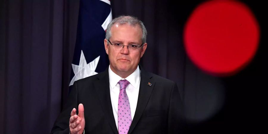 Der australische Premierminister Scott Morrison spricht während einer Pressekonferenz im Parlamentsgebäude.