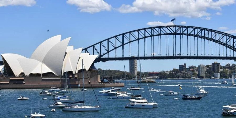 Das Opernhaus und die Sydney Harbour Bridge ergeben zusammen eines der beliebtesten Fotomotive der Welt. Foto: Dean Lewins/AAP/dpa