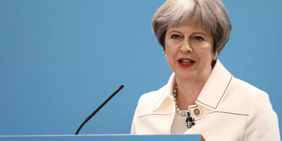 Die britische Premierministerin Theresa May muss nach dem Rücktritt von Davis mit weiterem Widerstand aus dem Brexit-Flügel ihrer Partei rechnen.