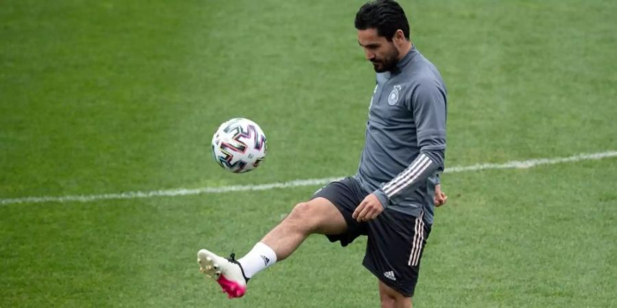 «Ich bin noch nicht fertig mit dem Kapitel Nationalmannschaft», sagt Ilkay Gündogan. Foto: Federico Gambarini/dpa
