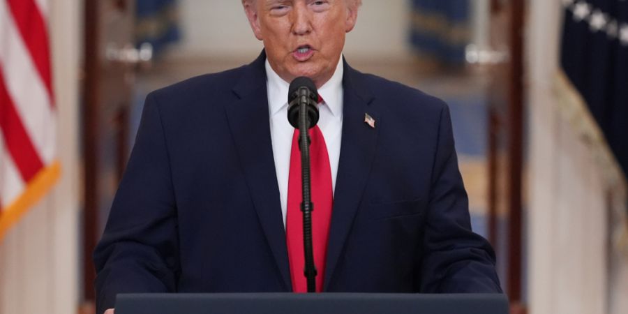 ARCHIV - US-Präsident Donald Trump spricht über den Iran-Krieg in der Cross Hall des Weißen Hauses  in Washington. Foto: Alex Brandon/AP Pool/dpa