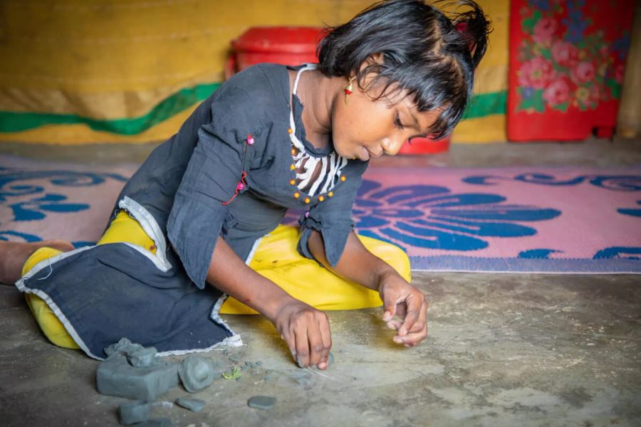 Ein Schulmädchen in Bangladesh