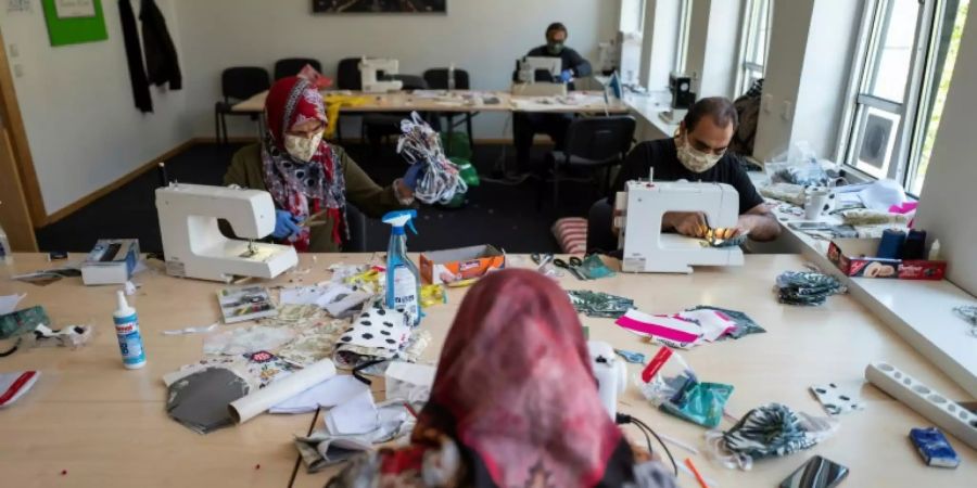 Afghanische Migrantinnen bei der Arbeit in Berlin