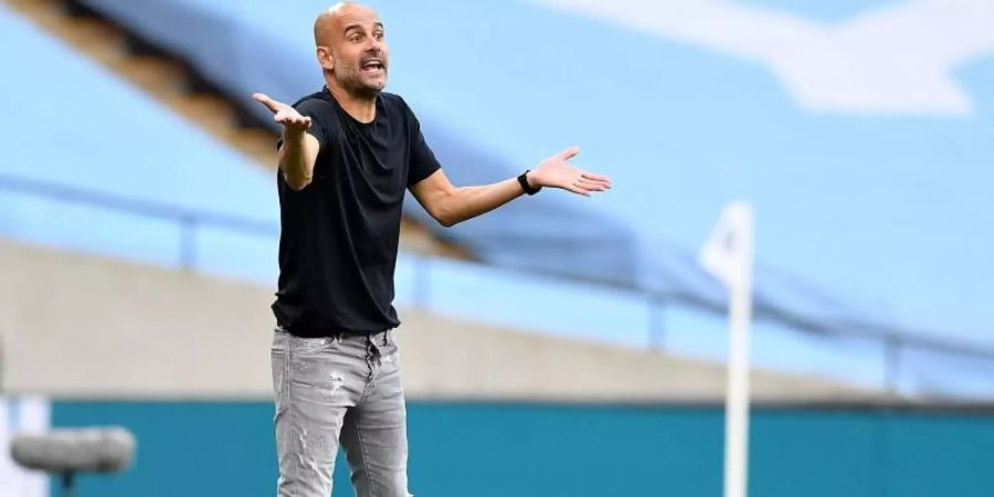 Hat abseits des Platzes nicht viel übrig für den FC Arsenal: ManCity-Coach Pep Guardiola. Foto: Justin Tallis/Nmc Pool/PA Wire/dpa