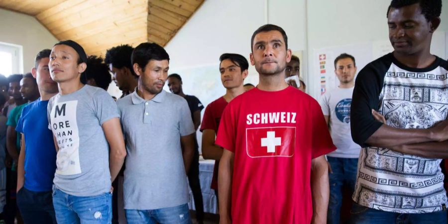 Asylsuchende beim Workshop «Zusammen sicher im Kanton Bern», durchgeführt von der Berner Kantonspolizei.