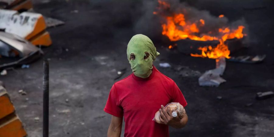 Rund 100 mutmassliche Plünderer wurden n Honduras festgenommen.