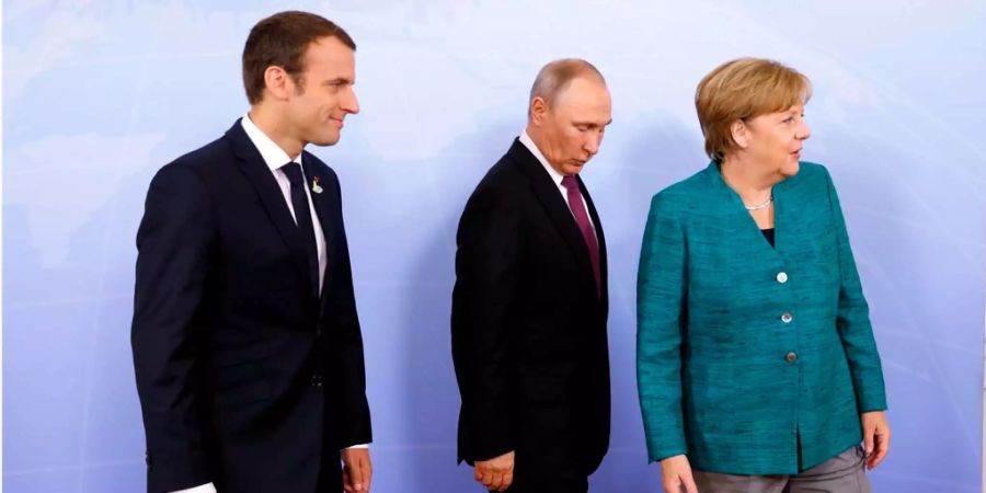 Emmanuel Macron, Wladimir Putin und Angela Merkel beim G20 in Hamburg.