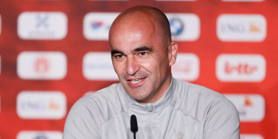 Bekommt es mit Belgien in Sevilla mit einem der besten Dritten der Gruppenphase zu tun: Trainer Roberto Martinez. Foto: Bruno Fahy/BELGA/dpa