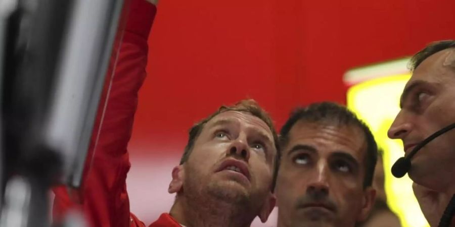 Ist am Sonntag in Suzuka gleich zweimal gefordert: Ferrari-Pilot Sebastian Vettel. Foto: Toru Takahashi/AP/dpa